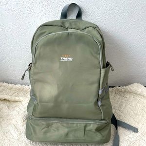 Green backpack with multiple pockets. Great used condition